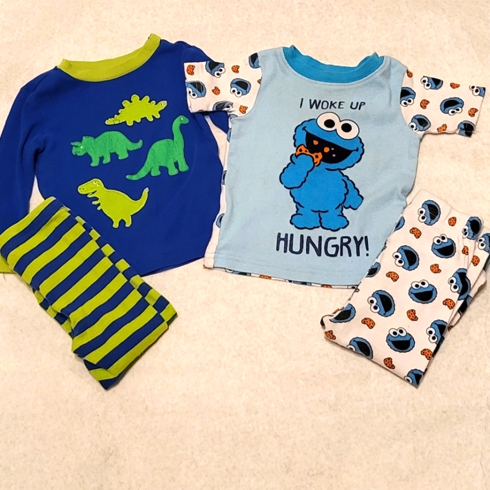 Two pair of two piece pajama sets